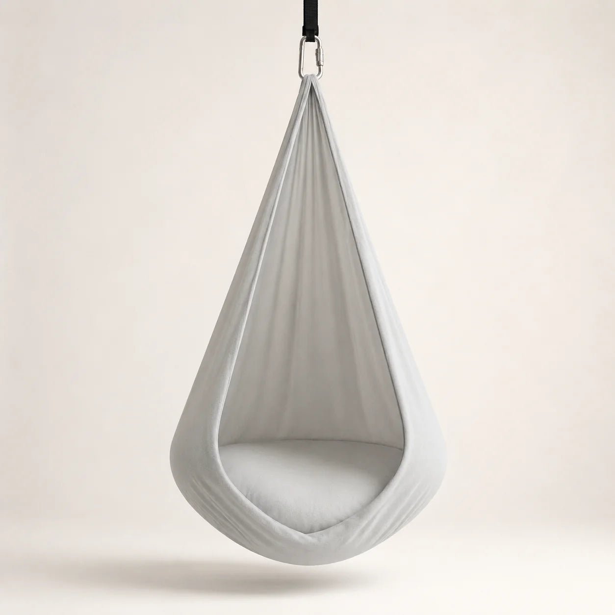 Sensory therapy swing designed for indoor relaxation, featuring a durable and comfortable construction that provides a soothing experience for users. 0